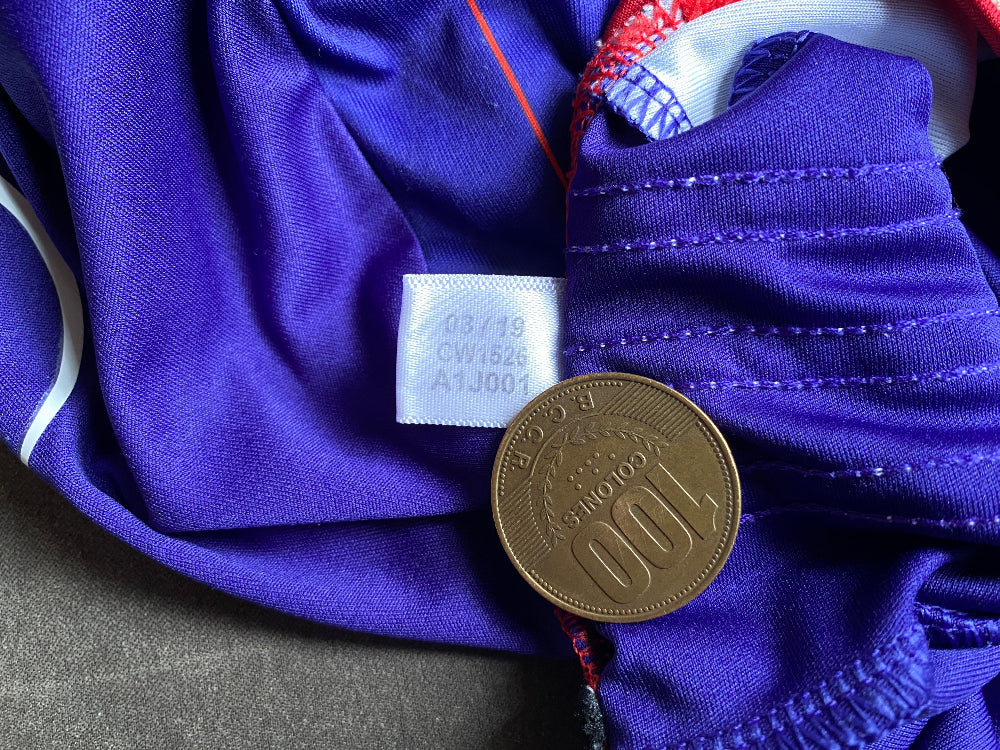 Fake Adidas football shirt style code tag