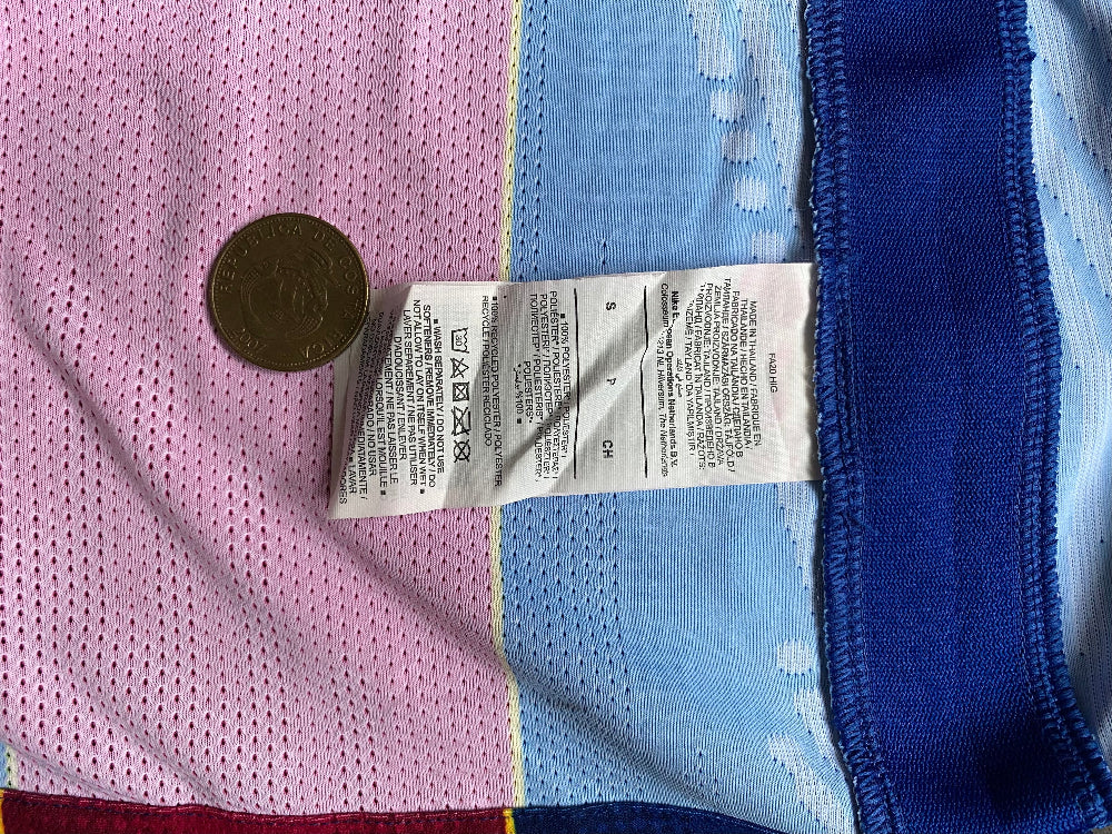 Player version football shirt labels